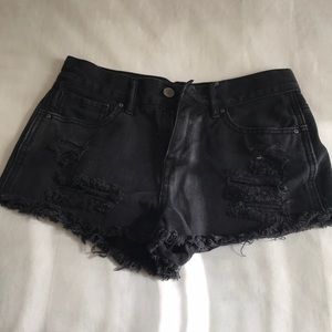 Black distressed shorts